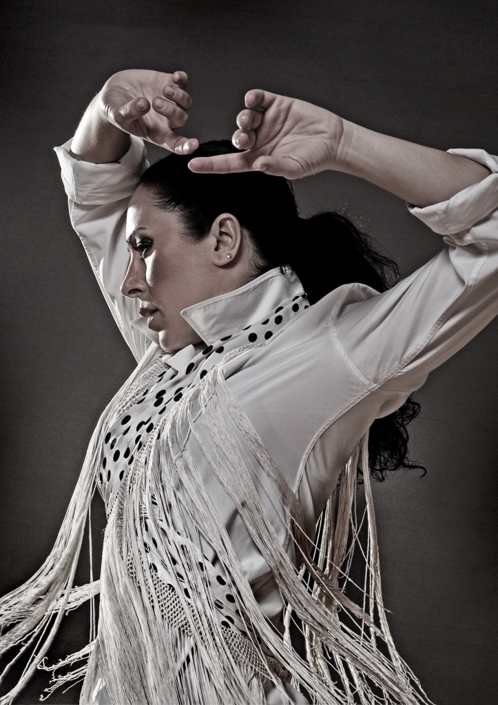 Flamenco Dancer Sonia Olla strikes a pose with her arms over head